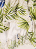 Rozkloszowana sukienka w roślinny deseń, kreacja z plisami 32894