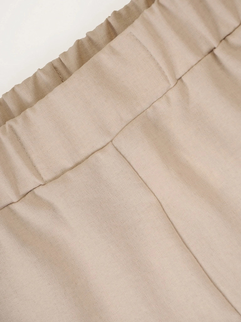 Beżowe lniane spodnie damskie z szerokimi nogawkami – swobodny fason z gumką w pasie dla pełnej wygody 39532