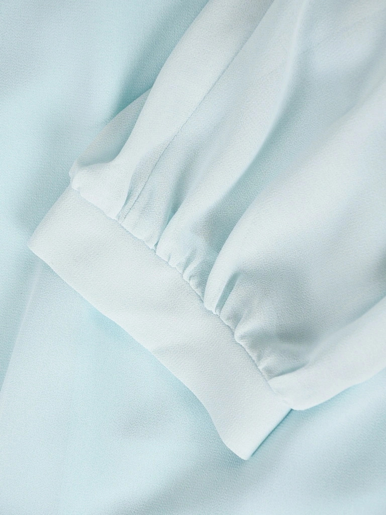 Elegancka sukienka rozkloszowana maxi w odcieniu mięty – wysmuklający dekolt w łódkę i rękaw 3/4 41695