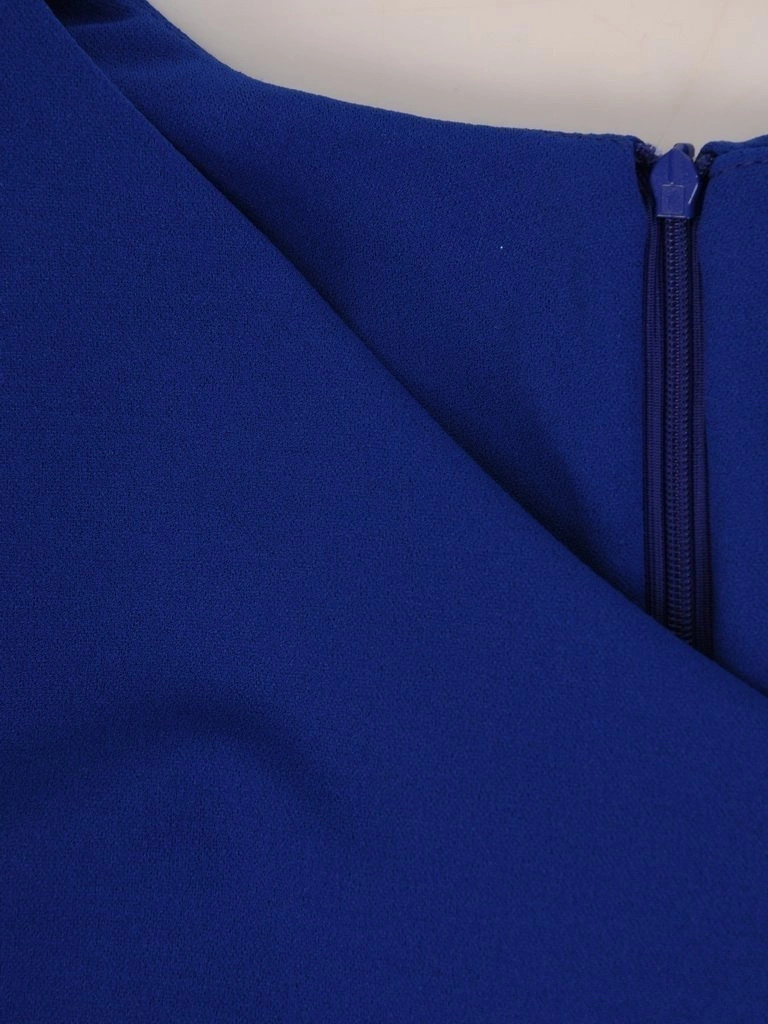 Chabrowa tunika wizytowa rozkloszowana – kobiecy krój z ozdobnymi falbanami 27110