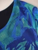 Elegancka sukienka trapezowa midi w zielono-granatowy print – fason tuszujący biodra z mankietami 38365