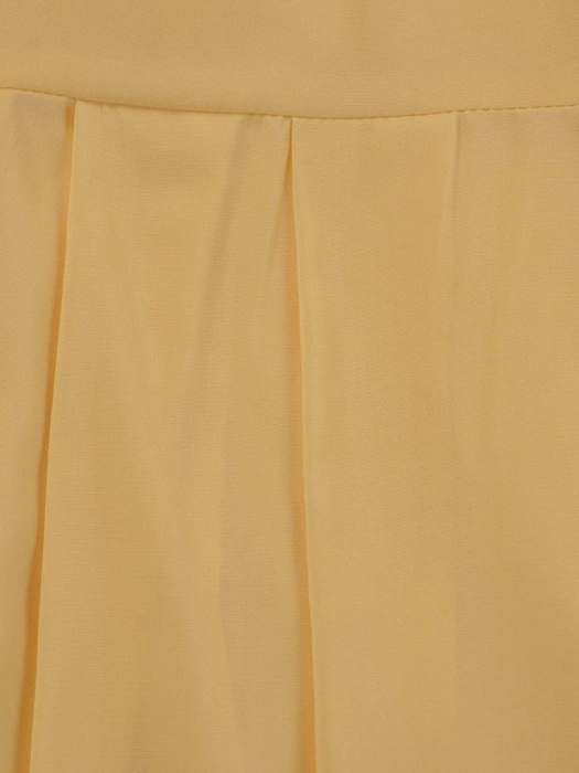 Plisowana sukienka rozkloszowana w żółtym kolorze – elegancki fason wysmuklający talię 10326