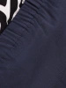 Granatowa spódnica do kolan o prostym fasonie na jesień – komfortowa guma w pasie i tylne rozcięcie 40742