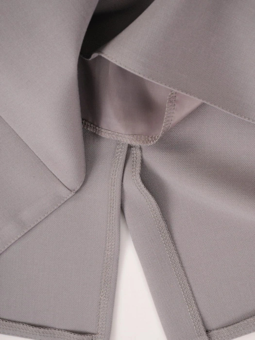 Elegancka spódnica midi o prostym kroju szara – kobiecy fason z rozcięciem modelujący sylwetkę 35631
