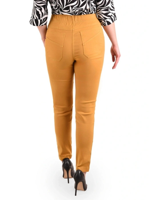Eleganckie spodnie damskie w kolorze musztardowym – dopasowany fason z gumką w pasie na jesień 34890