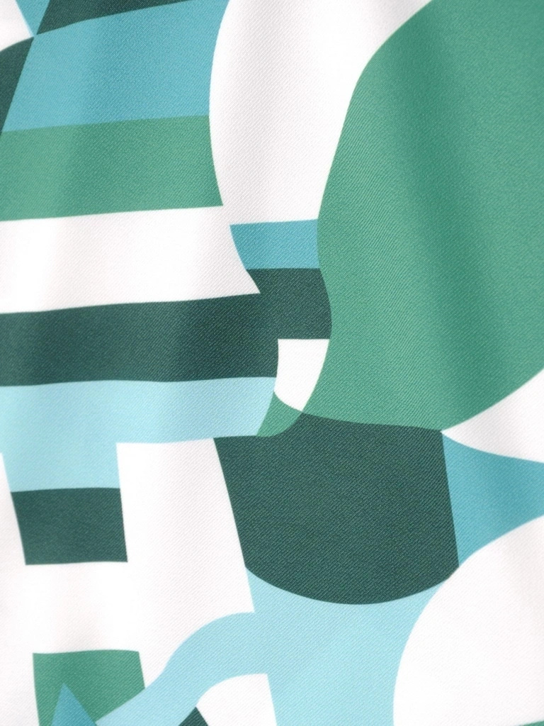 Zielona sukienka midi w geometryczny print – tuszujący prosty krój z ozdobnymi patkami 35505