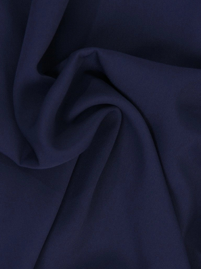 Elegancka granatowa sukienka trapezowa z długim rękawem – kobiecy fason z efektownym wiązaniem 18288